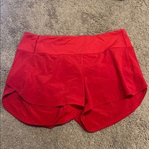size 8 - lululemon red shorts - 4”